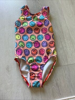 Like NEW GK smileyworld gymnastics leotard